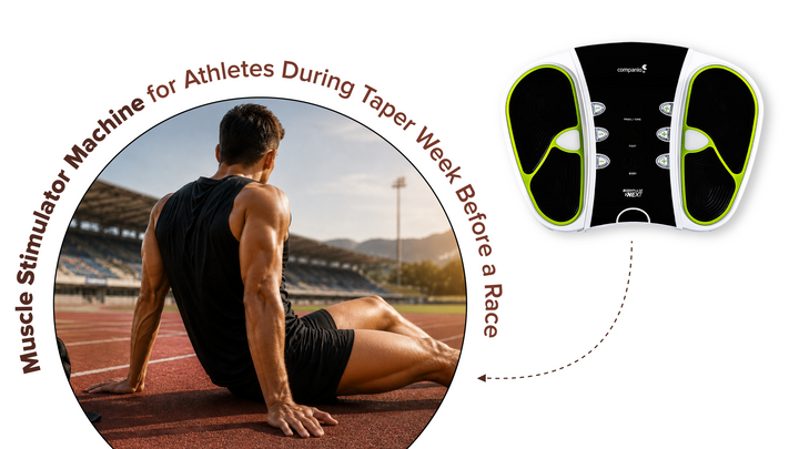 Athlete relaxing on a running track with a Companio muscle stimulator machine, illustrating muscle recovery during taper week before a race.