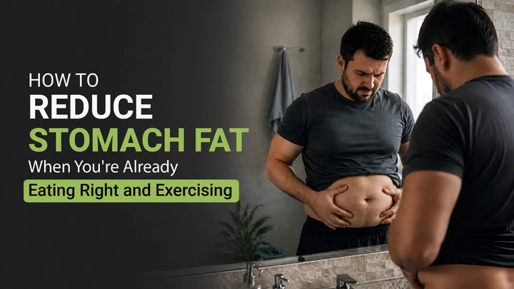 Man looking at excess belly fat in the mirror while exploring how to reduce stomach fat through healthy eating, exercise, and lifestyle changes.